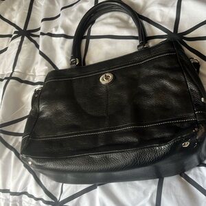 Coach bag. Has a few tears on one side but still has a lot of life!